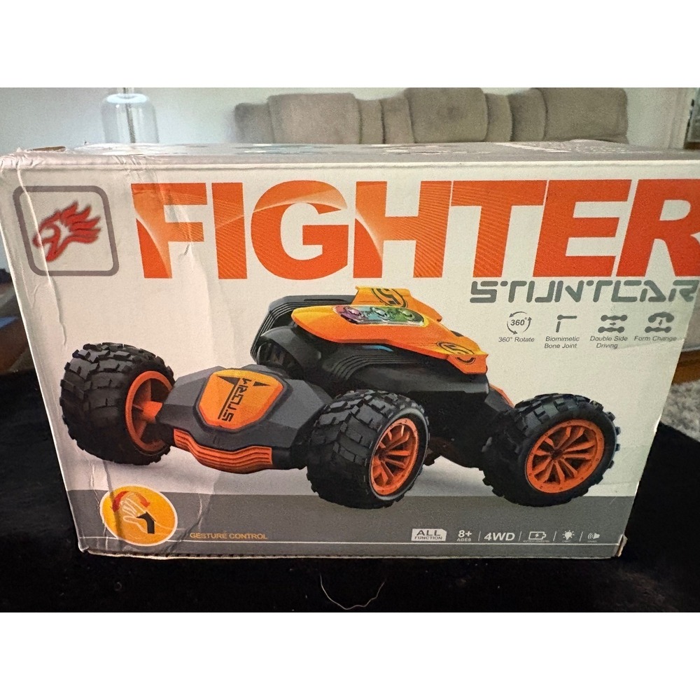 Fighter Stunt Car Gesture Control RC Vehicle 4WD 360 Rotation Orange Black Toy